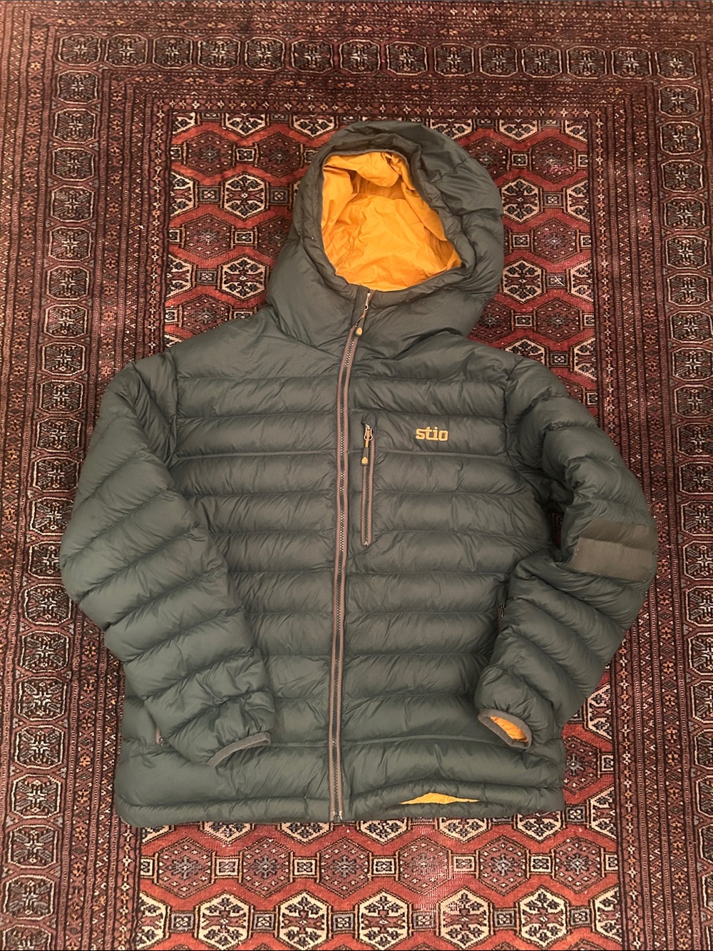 Stio Men's Hooded Down Puffer Jacket in Olive with Gold Lining